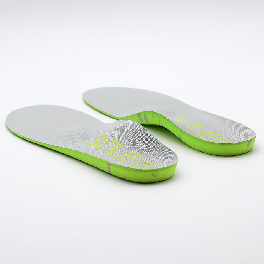 A pair of SOLE5 Full Length Orthotic Insoles in front of a white background 