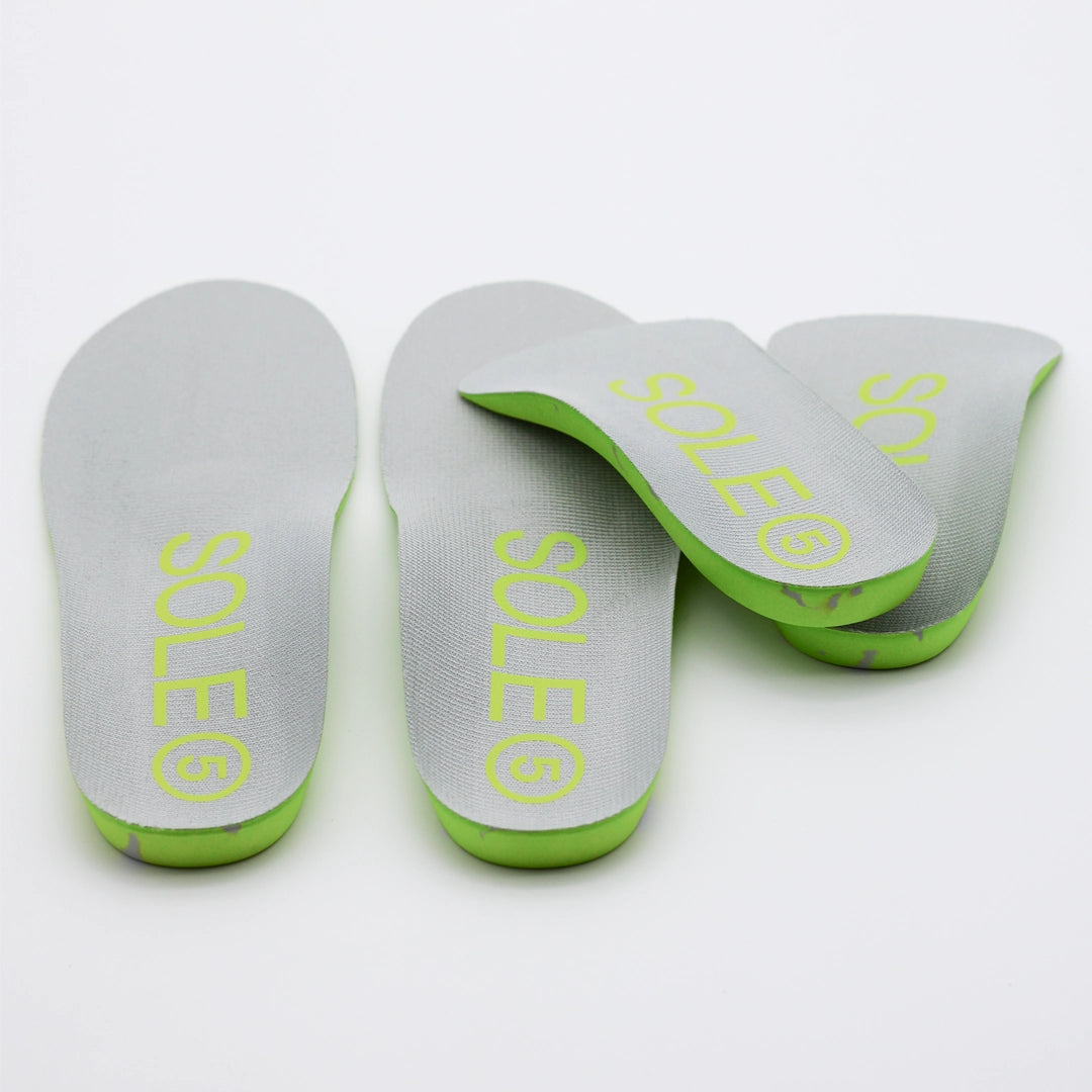 A pair of SOLE5 Full & Half Length Orthotic Insoles slightly stacked on each other.