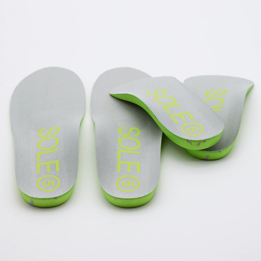 A pair of SOLE5 Full & Half Length Orthotic Insoles slightly stacked on each other.