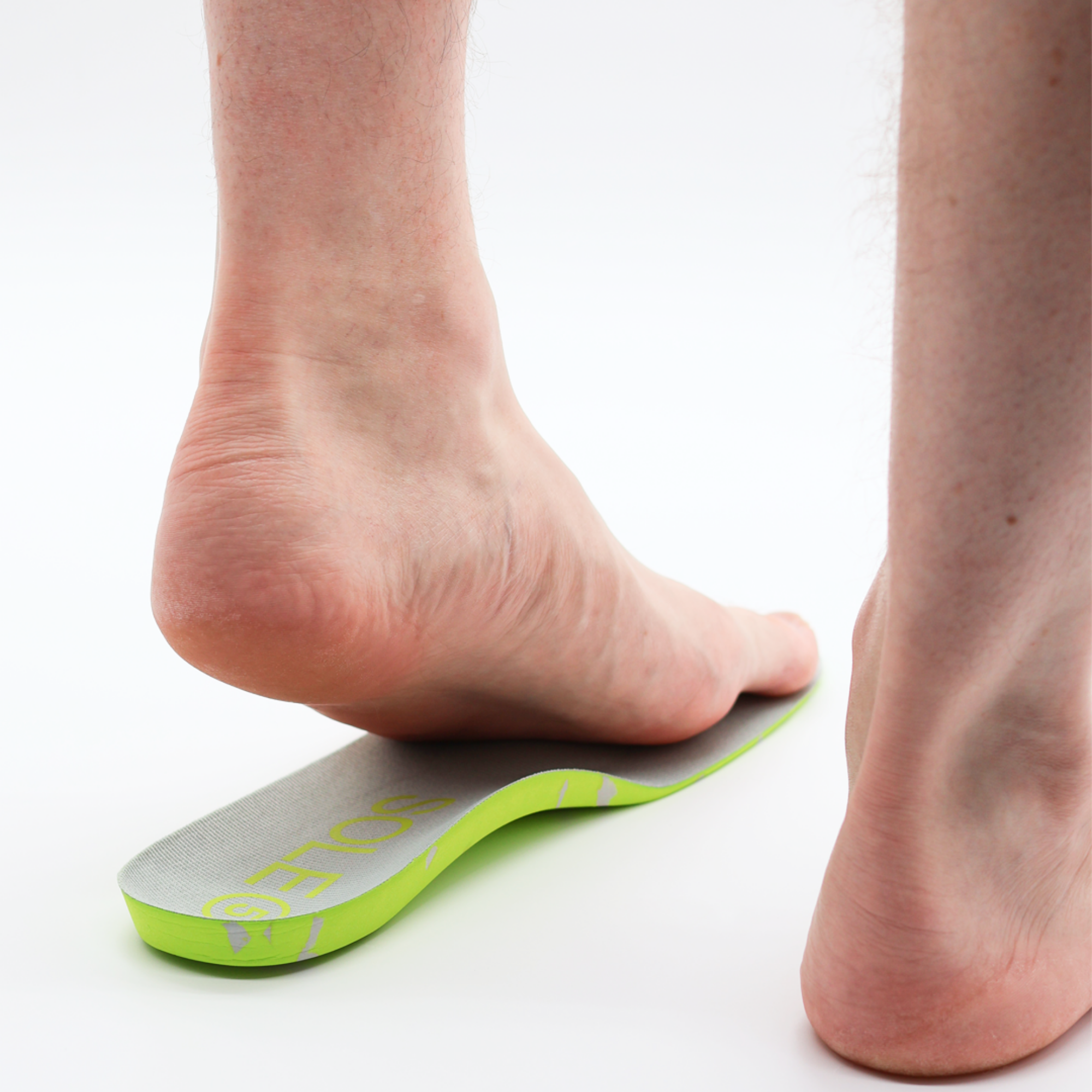 A foot being placed on top of a SOLE5 orthotic insole