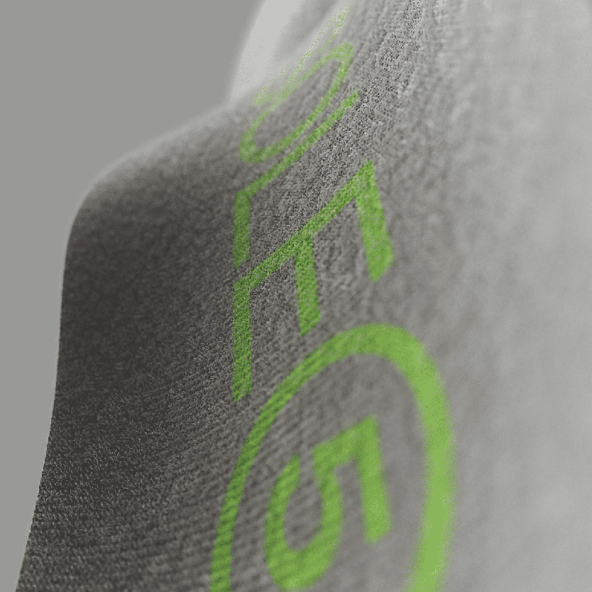 Close up of SOLE5 Orthotic Insole highlighting the grey fabric texture and arch shape