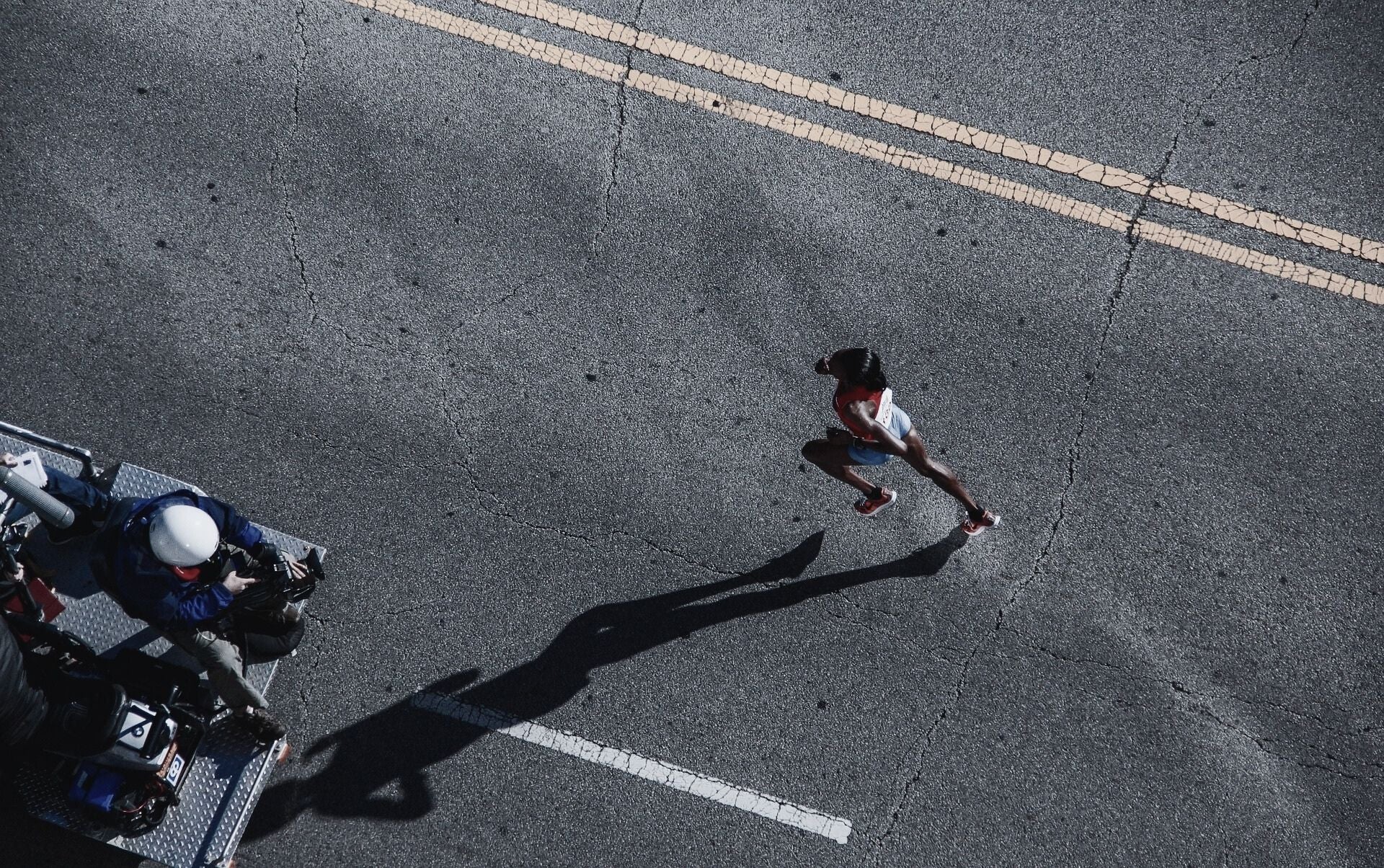 Birdseye view of woman in a running race