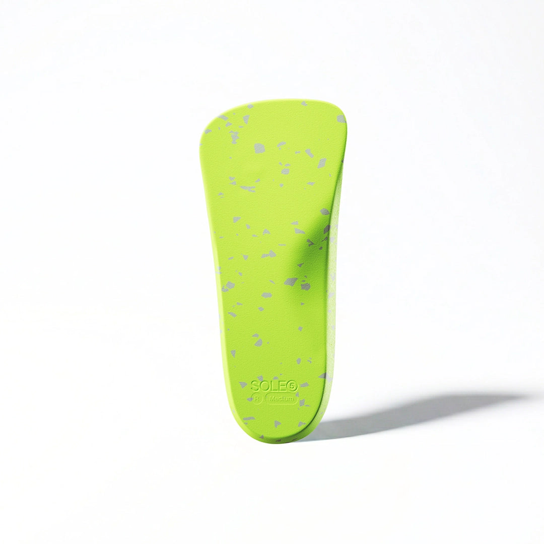 SOLE5 Orthotic Insole image highlighting the Grey and Yellow Flake pattern on a white background